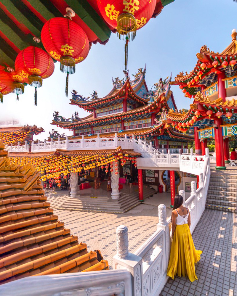 A girl standing and staring thean hou temple