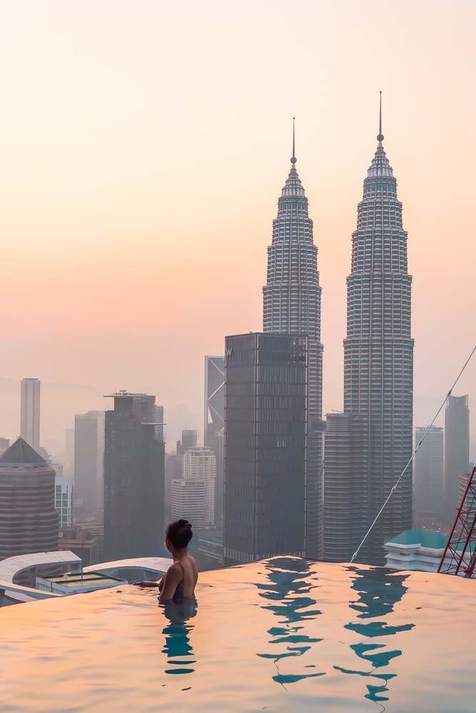 The view of Petronas tower from rooftop pool at face suites in kuala lumpur malaysia