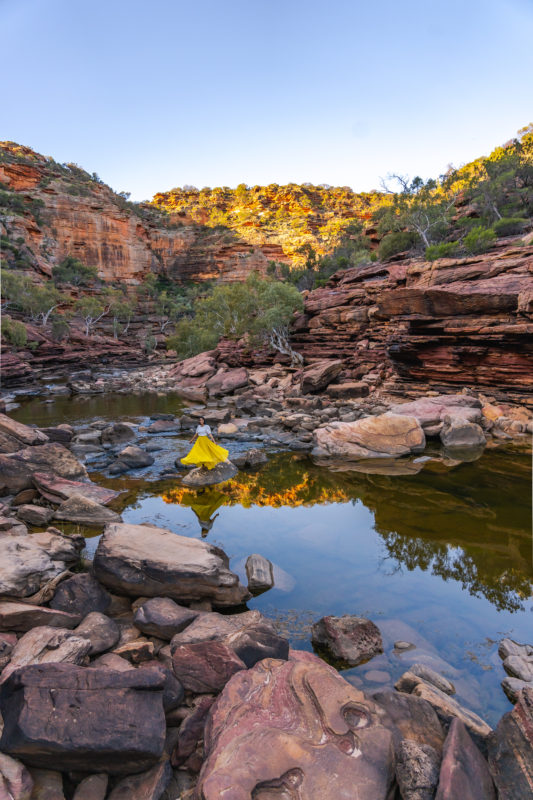 A girl in yellow skirt at Z bend river trail- Perth to Kalbarri road trip