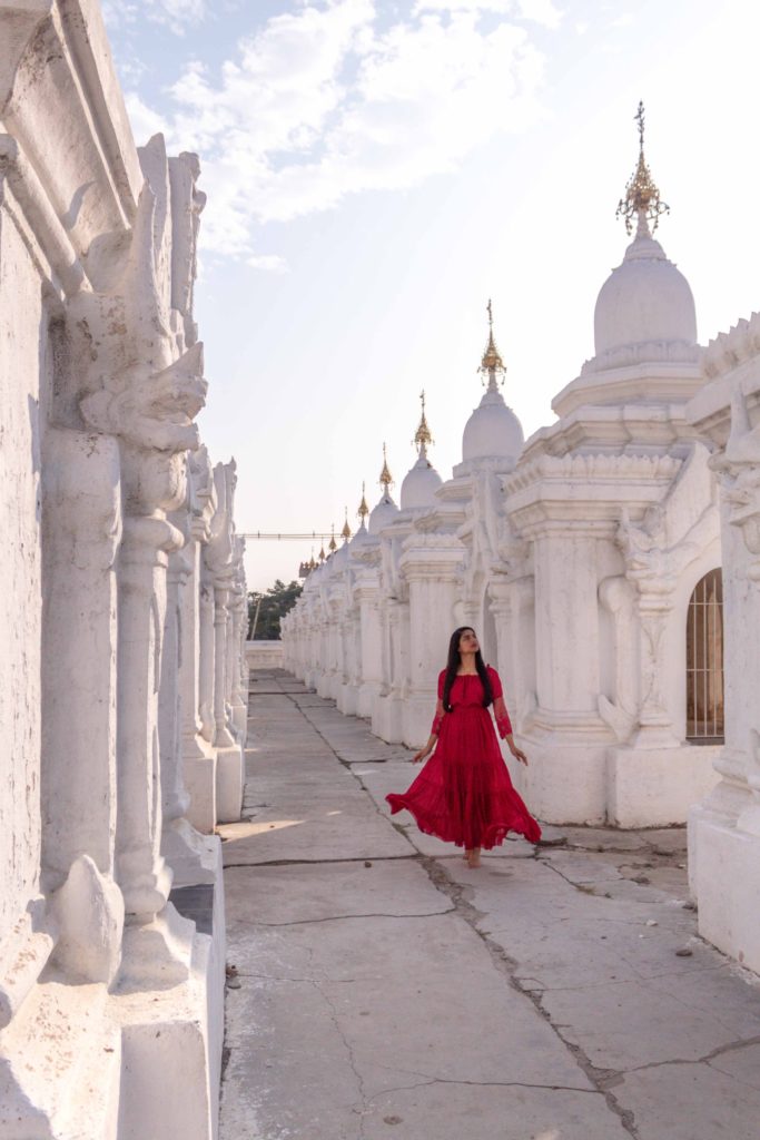 A girl in red dress at Kuthodaw Pagoda