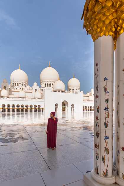 A girl in Abaya at Grand Mosque in Abu Dhabi which is the best photography spots in Abu Dhabi
