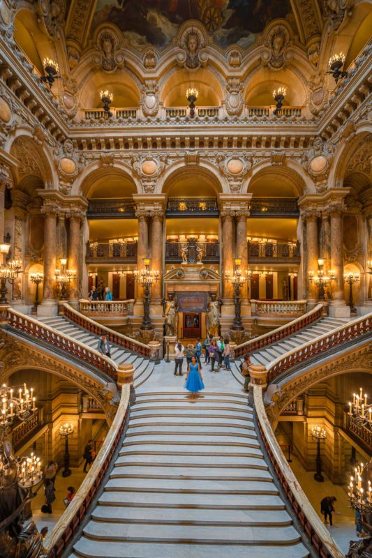 The golden details on the ceiling in Grand foyer room at Palais Garnier