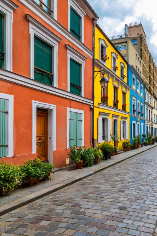 The colorful houses at Rue Cremieux street in Paris are one of the best Instagram spot sin Paris.